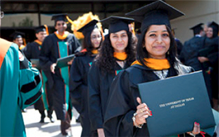 Graduating Students receiving Diplomas